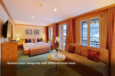 Ein Bett oder Betten in einem Zimmer der Unterkunft Hotel Kirchbühl Superior
