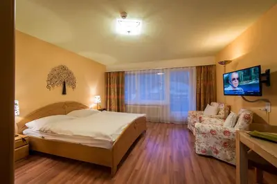 Ein Bett oder Betten in einem Zimmer der Unterkunft Badehotel Salina Maris – Wellness & Vintage
