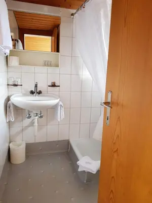 Ein Badezimmer in der Unterkunft Gasthof Schoenegg B&B
