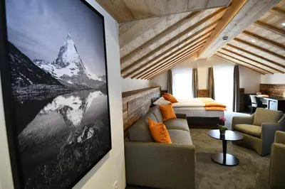 Ein Sitzbereich in der Unterkunft Hotel Elite