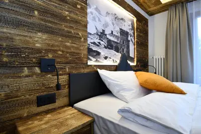 Ein Bett oder Betten in einem Zimmer der Unterkunft Hotel Elite