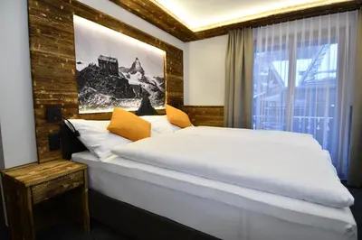 Ein Bett oder Betten in einem Zimmer der Unterkunft Hotel Elite