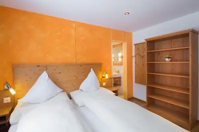 Ein Bett oder Betten in einem Zimmer der Unterkunft Hotel Edelweiss Superior