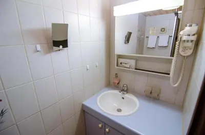 Ein Badezimmer in der Unterkunft Hotel Blumental