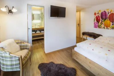 Ein Bett oder Betten in einem Zimmer der Unterkunft Hotel Blumental