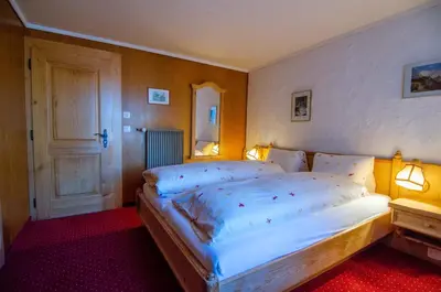 Ein Bett oder Betten in einem Zimmer der Unterkunft Hotel Blumental