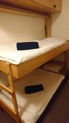 Ein Bett oder Betten in einem Zimmer der Unterkunft Studios Bellevue 1 et 2, ski lift 150m