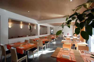 Ein Restaurant oder anderes Speiselokal in der Unterkunft Eco-Hotel Cristallina