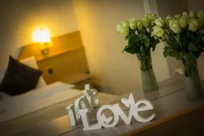 Ein Bett oder Betten in einem Zimmer der Unterkunft Hotel Bristol