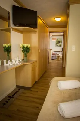 Ein Bett oder Betten in einem Zimmer der Unterkunft Hotel Bristol