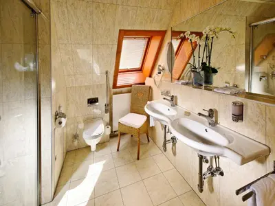 Ein Badezimmer in der Unterkunft Hotel Ambassador