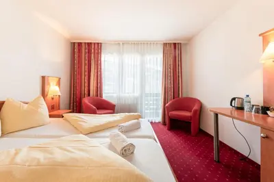 Ein Bett oder Betten in einem Zimmer der Unterkunft Hotel Kreuz