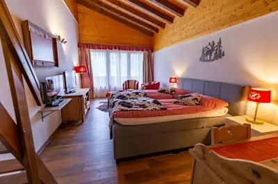 Ein Bett oder Betten in einem Zimmer der Unterkunft Chalet-Hotel Beau-Site