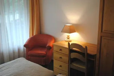 Ein Bett oder Betten in einem Zimmer der Unterkunft Chalet-Hotel Beau-Site