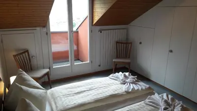 Ein Bett oder Betten in einem Zimmer der Unterkunft Waldhotel Unspunnen