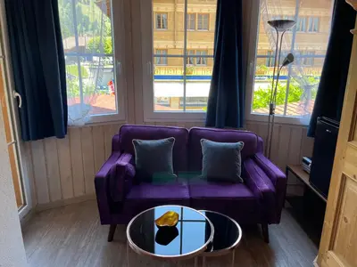 Ein Sitzbereich in der Unterkunft Chalet Hotel Adler