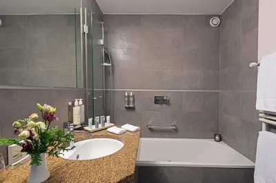 Ein Badezimmer in der Unterkunft Le Mirabeau Resort & Spa