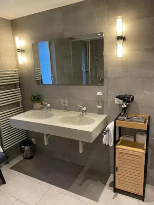 Ein Badezimmer in der Unterkunft Hotel Europe Brig