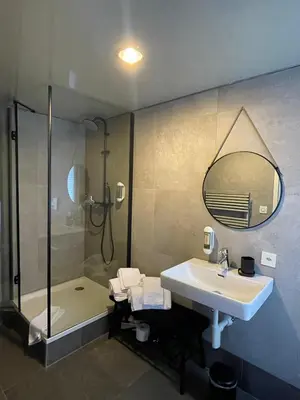 Ein Badezimmer in der Unterkunft Hotel Europe Brig
