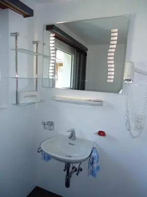 Ein Badezimmer in der Unterkunft Hotel Primavera