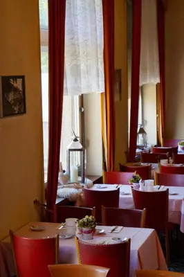 Ein Restaurant oder anderes Speiselokal in der Unterkunft Hotel Victoria