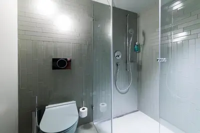 Ein Badezimmer in der Unterkunft Hotel Aare Thun