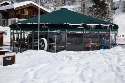 Hotel THE LARIX ski-in ski-out im Winter