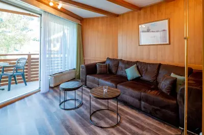 Ein Sitzbereich in der Unterkunft dala Hotel & Apartments