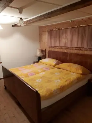 Ein Bett oder Betten in einem Zimmer der Unterkunft Tepilanti
