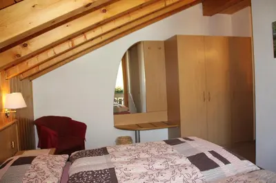 Ein Bett oder Betten in einem Zimmer der Unterkunft Haus Pan
