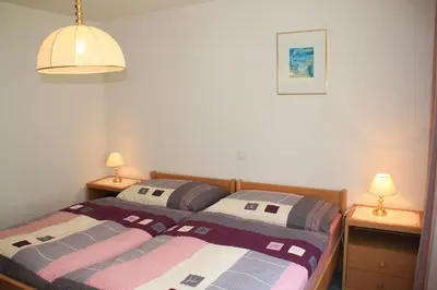 Ein Bett oder Betten in einem Zimmer der Unterkunft Haus Pan