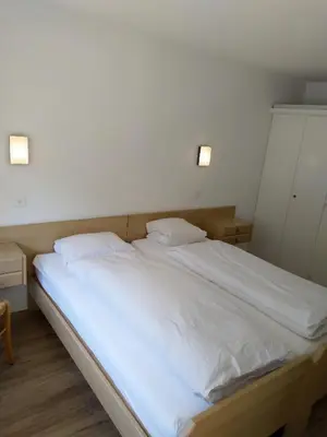 Ein Bett oder Betten in einem Zimmer der Unterkunft Fortuna 404