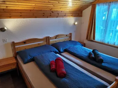 Ein Bett oder Betten in einem Zimmer der Unterkunft Ferienwohnung Delphin