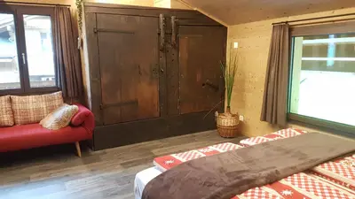 Ein Bett oder Betten in einem Zimmer der Unterkunft Chalet bei der Arve