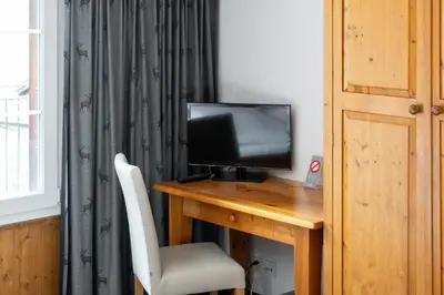 TV/Unterhaltungsangebot in der Unterkunft Jungfrau Lodge, Swiss Mountain Hotel