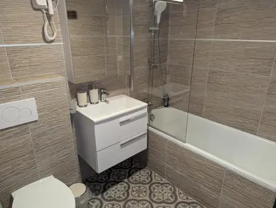 Ein Badezimmer in der Unterkunft Hotel Schützen Lauterbrunnen