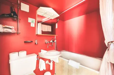 Ein Badezimmer in der Unterkunft Hotel Alpina