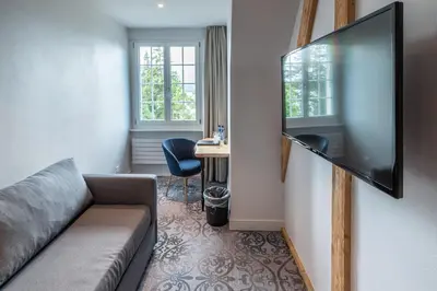 TV/Unterhaltungsangebot in der Unterkunft Parkhotel Gunten – Beach & Spa