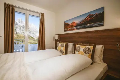 Ein Bett oder Betten in einem Zimmer der Unterkunft Hotel Römerhof