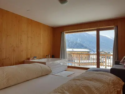 Ein Bett oder Betten in einem Zimmer der Unterkunft Chalet Breithorn- Perfect for Holiday with Amazing View!