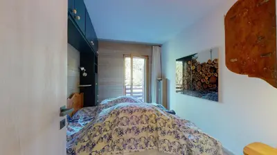 Ein Bett oder Betten in einem Zimmer der Unterkunft Beautiful apartment in the center of Crans-Montana with a large balcony