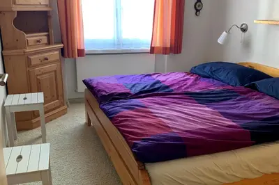 Ein Bett oder Betten in einem Zimmer der Unterkunft Egginer 2