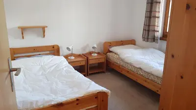 Ein Bett oder Betten in einem Zimmer der Unterkunft Ferienwohnung Silberdistel