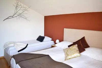 Ein Bett oder Betten in einem Zimmer der Unterkunft Hostellerie d'Orzival
