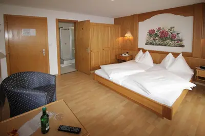 Ein Bett oder Betten in einem Zimmer der Unterkunft Hotel Restaurant Mattmarkblick