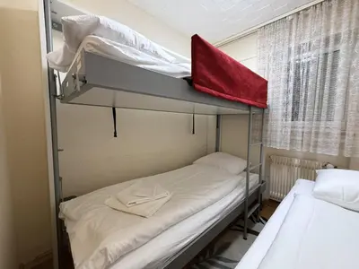 Ein Bett oder Betten in einem Zimmer der Unterkunft Salute 105