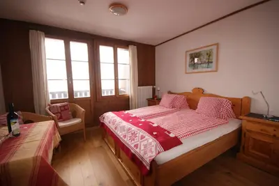 Ein Bett oder Betten in einem Zimmer der Unterkunft Hotel Fassbind Beausite