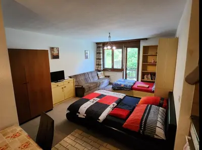 Ein Bett oder Betten in einem Zimmer der Unterkunft Gemmi apartment Inden Leukerbad
