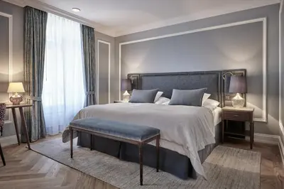 Ein Bett oder Betten in einem Zimmer der Unterkunft Victoria Jungfrau Grand Hotel & Spa