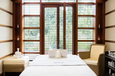 Ein Bett oder Betten in einem Zimmer der Unterkunft Victoria Jungfrau Grand Hotel & Spa